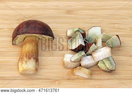 Half And Sliced Edible Mushroom Imleria Badia, Commonly Known As Bay Bolete. Fruit Bodies Have A Che