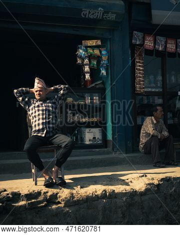 Kathmandu, Nepal, 04 23 2022: A Man Chilling In The Streets Of Kathmandu With His Hand Behind His He