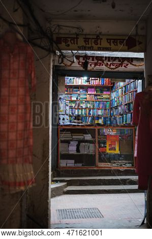 Kathmandu, Nepal, 04 23 2022: A Man Sitting In His Book Store In Kathmandu