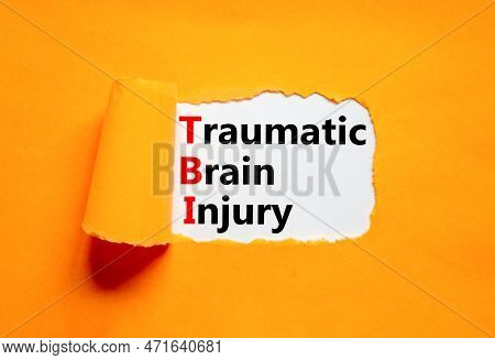 Tbi Traumatic Brain Injury Symbol. Concept Words Tbi Traumatic Brain Injury On White Paper On A Beau
