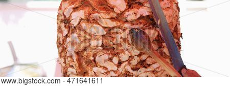 Chef Cuts Grilled Chicken Meat From Rotating Spit And Prepares Traditional Street Food. Street Shawa