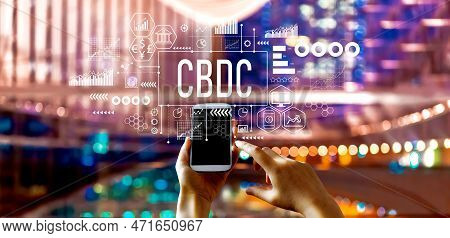 Cbdc - Central Bank Digital Currency Concept With Big City Lights At Night