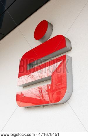 Bad Harzburg, Germany - February 17, 2023: Illuminated Sign With The Symbol Of The Sparkasse, Saving