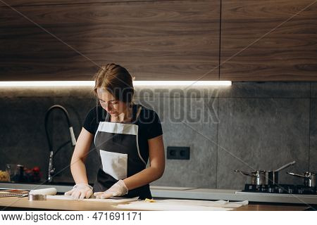 Pastry Chef Makes Muffins And Pours Dough Into Molds