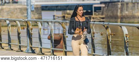 Attractive Woman Walking At Promenade, Buenos Aires