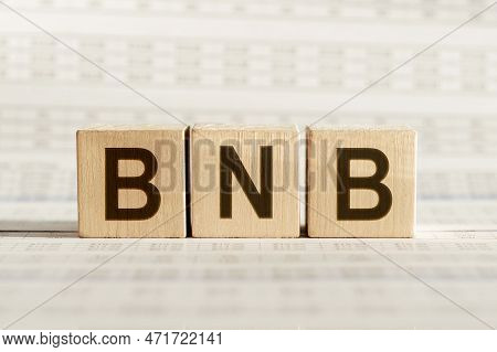Bnb Word By Wooden Block Words On White Paper Background. Bnb Or Binance In Concept Of Digital Money