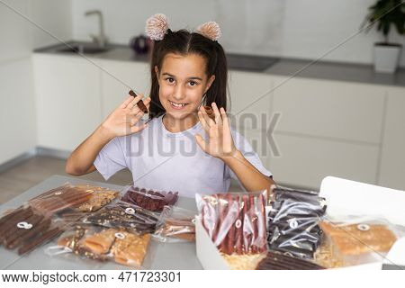 Little Girl With A Box Of Pastilles