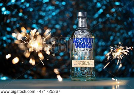 Illustrative Editorial Of Absolut Vodka Surrounded By Sparklers. It Is A World Famous Brand Of Swedi