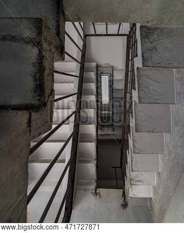 The View Upwards From The Ground To Concrete Spiral Staircases Pattern From The Ground Floor Are In 