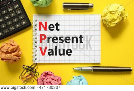 Npv Net Present Value Symbol. Concept Words Npv Net Present Value On White Note On A Beautiful Yello