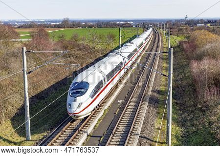 Highspeed Train Ice - Inter City Express - Passes A Bridge In Rural Landscape, Germany