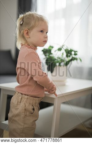 Cochlear Implant System. Installation Cochlear Implant On Child Girl Ear For Restores Hearing. Kid H