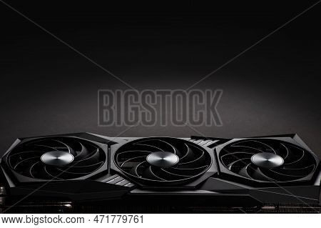 Video Card With Three Coolers From The Computer On A Dark Background.concept Computer Harware