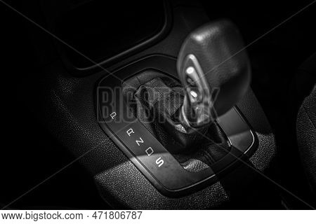 Top View Of Automatic Gearbox Selector On Black Background. Automatic Transmission. Interior Details