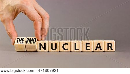 Nuclear Or Thermonuclear Energy Symbol. Concept Words Nuclear Or Thermonuclear On Wooden Cubes. Beau