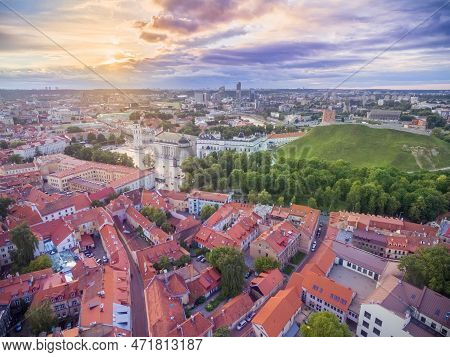 Vilnius Old Town Beautiful Sunset And Cityscape. Cathedral, Gediminas Castle And Beautiful Sky In Ba