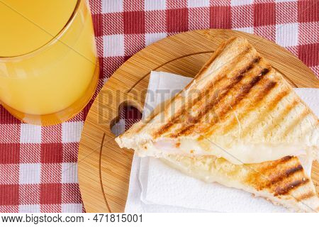 Grilled Ham And Cheese. Sandwich With Cheese And Ham On The Grill.