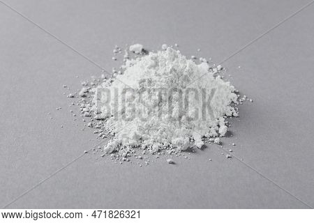 Heap Of Calcium Carbonate Powder On Light Grey Table, Closeup