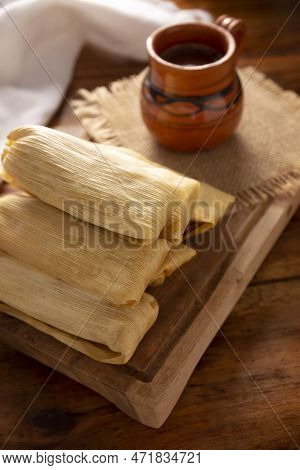 Tamales. Prehispanic Dish Typical Of Mexico And Some Latin American Countries. Corn Dough Wrapped In