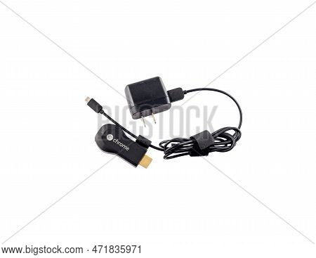 1st Generation Chromecast Hdmi Dongle Isolated On White Background. February 17, 2023: Swat, Pakista