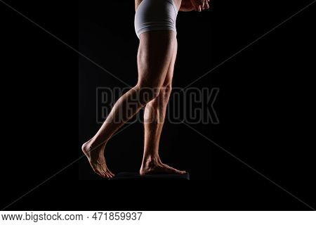 Close-up Of Bodybuilders Legs Ready For Competitive Sport White Panties