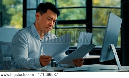 Disappointed Angry Asian Office Manager Mature Man Specialist Lawyer Banker Work With Paper Document