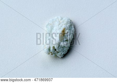 Macro Stone Albite Mineral White Background Close Up. Aquamarine On Albite