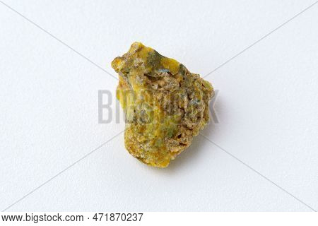 Rough Yelow Opal Crystal, Unpolished Mineral. Close-up, White Background