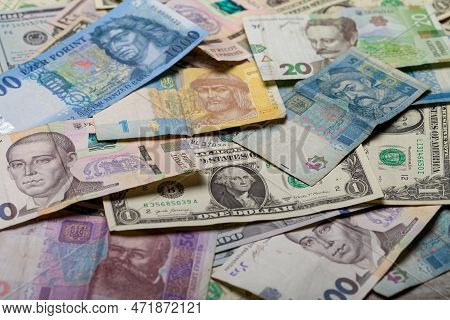 Paper Money From Different Countries. Money From Different Countries: Dollars, Hryvnia, Forint