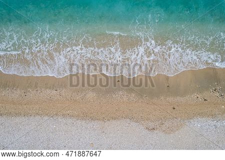 Straight Down View On Waves And Shore Of Small Stones By Bunec Beach Area In Summer 2022, Albania