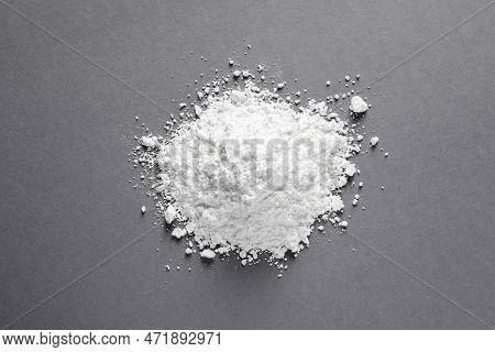 Heap Of Calcium Carbonate Powder On Grey Table, Top View