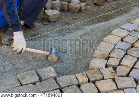 Paving Of Street With Granite Stones Was Laborious Task That Required Skilled Workers To Use Industr