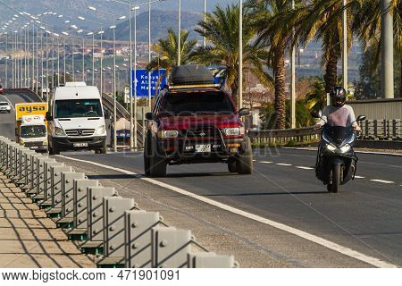 Side, Turkey -january 22, 2023: Red    Nissan Terrano   Is Driving Fast On The Street On A Warm Summ