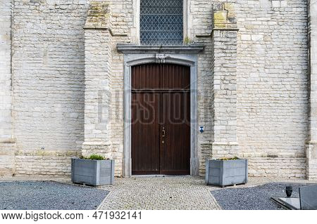 Ossel, Flemish Brabant Region, Belgium, Feb. 25 2023 - Facade And Entrance Of The Saint John The Bap