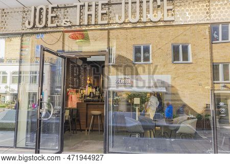 Close-up View Of Open Door To Café Joe And The Juice. Sweden. Uppsala. 05.14.2022.