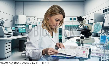 Caucasian Female Scientist, Biologist, Biochemist Works In Research Laboratory. Pharmaceutical Or Ac
