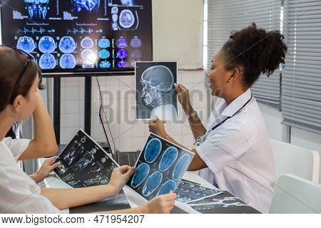 Group Of Medical Student Study In Class Room. Medical Students Studying Human Brain Disease Diagnosi