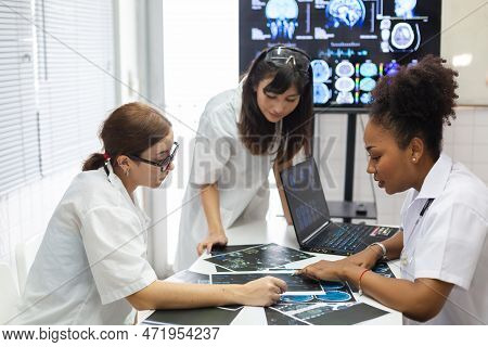 Group Of Medical Student Study In Class Room. Medical Students Studying Human Brain Disease Diagnosi
