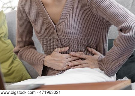 Flatulence Asian Young Woman, Girl Hand In Stomach Ache, Suffer From Food Poisoning, Abdominal Pain 