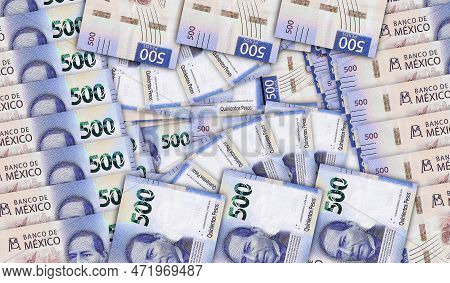 Mexico Pesos Banknotes In A Cash Fan Mosaic Pattern. Mexican Mxn 500 Notes. Abstract Concept Of Bank