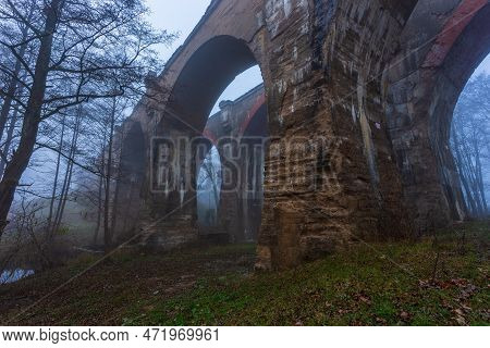 Old Concrete Railway Bridge In Stanczyki. Foggy Morning. Mazury, Poland