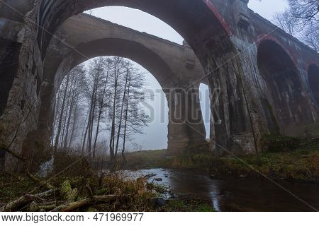 Old Concrete Railway Bridge In Stanczyki. Foggy Morning. Mazury, Poland