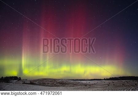 Northern Lights - Aurora Borealis Dancing In The Night Sky.