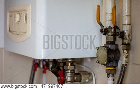Heating Gas Boiler. Symbolic Image Of The Heating Season At Home. The Dial On A Domestic Combi Boile