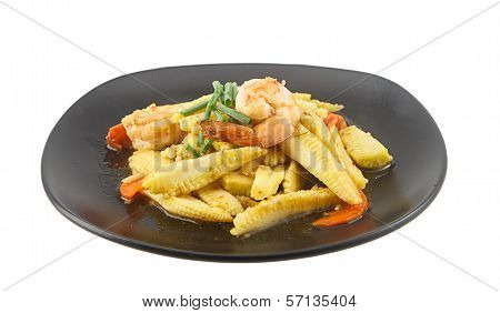 Stir Fried Babycorn And Shrimp On Dish Isolated On White