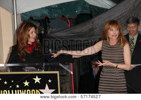 Dana Delaney and Marg Helgenberger at the Marg Helgenberger Hollywood Walk of Fame Star Ceremony, Hollywood, CA 01-23-12