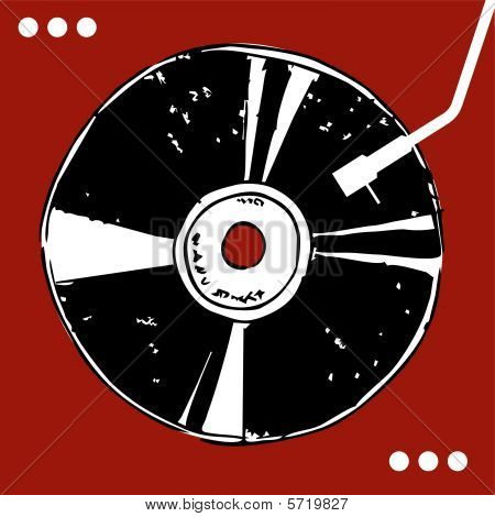 Disco in vinile su sfondo rosso.