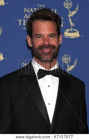 LOS ANGELES - JUN 20:  Tuc Watkins at the 2014 Creative Daytime Emmy Awards at the Bonaventure Westin on June 20, 2014 in Los Angeles, CA