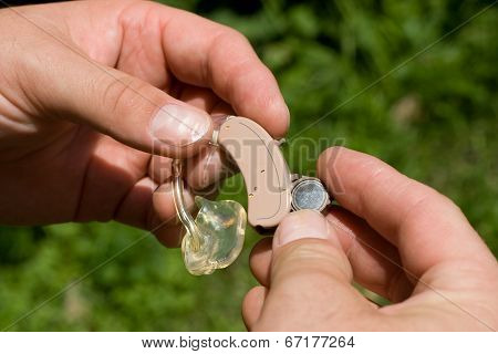 Changing A Digital Hearing Aid Battery.