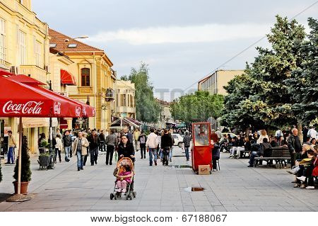 eople walking around in Bitola